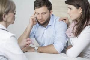 People meeting and talking at table