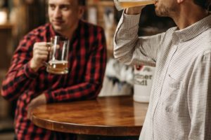 drinking beer with male friends