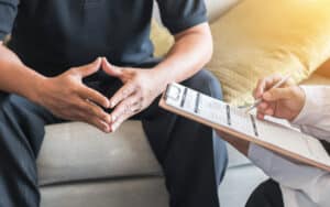 A man with BPH talking to a doctor about Rezūm in Chattanooga