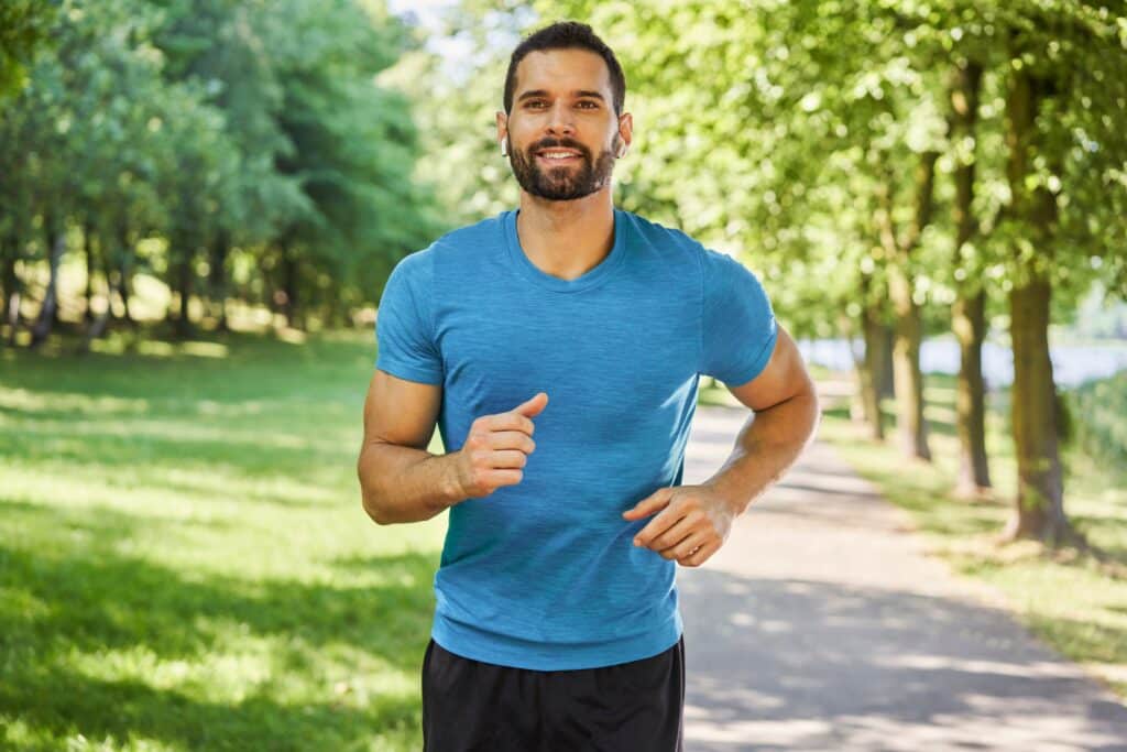 A man jogging after urethral stricture disease treatment in Chattanooga