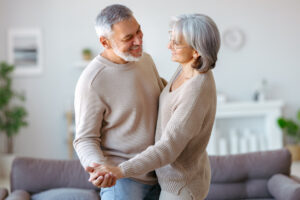 Man dancing with wife after getting a male sling for urinary leakage in Chattanooga